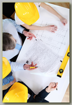 Builders reviewing their blueprints